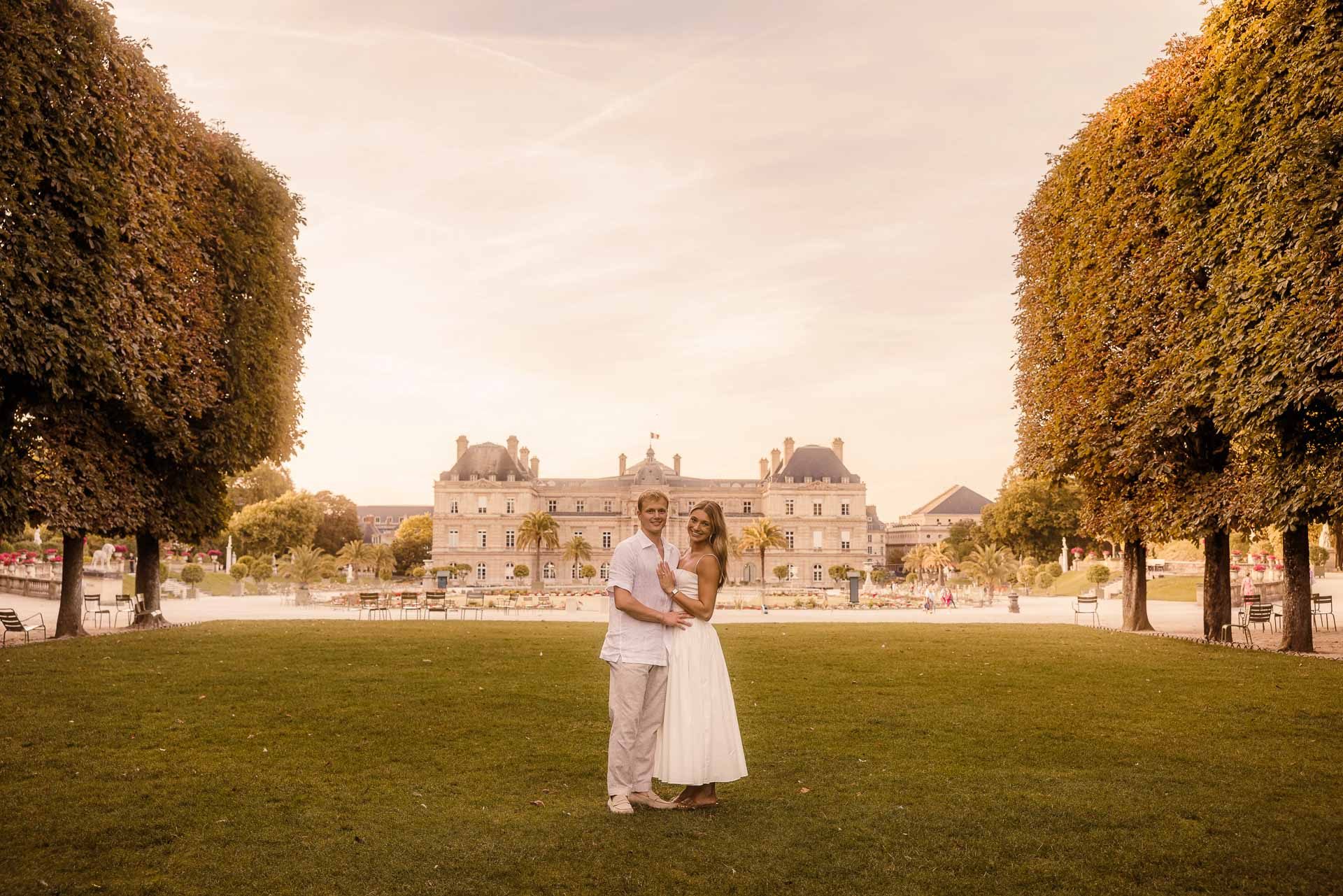 Couple in front of the Luxembourg Palace at sunset, Paris