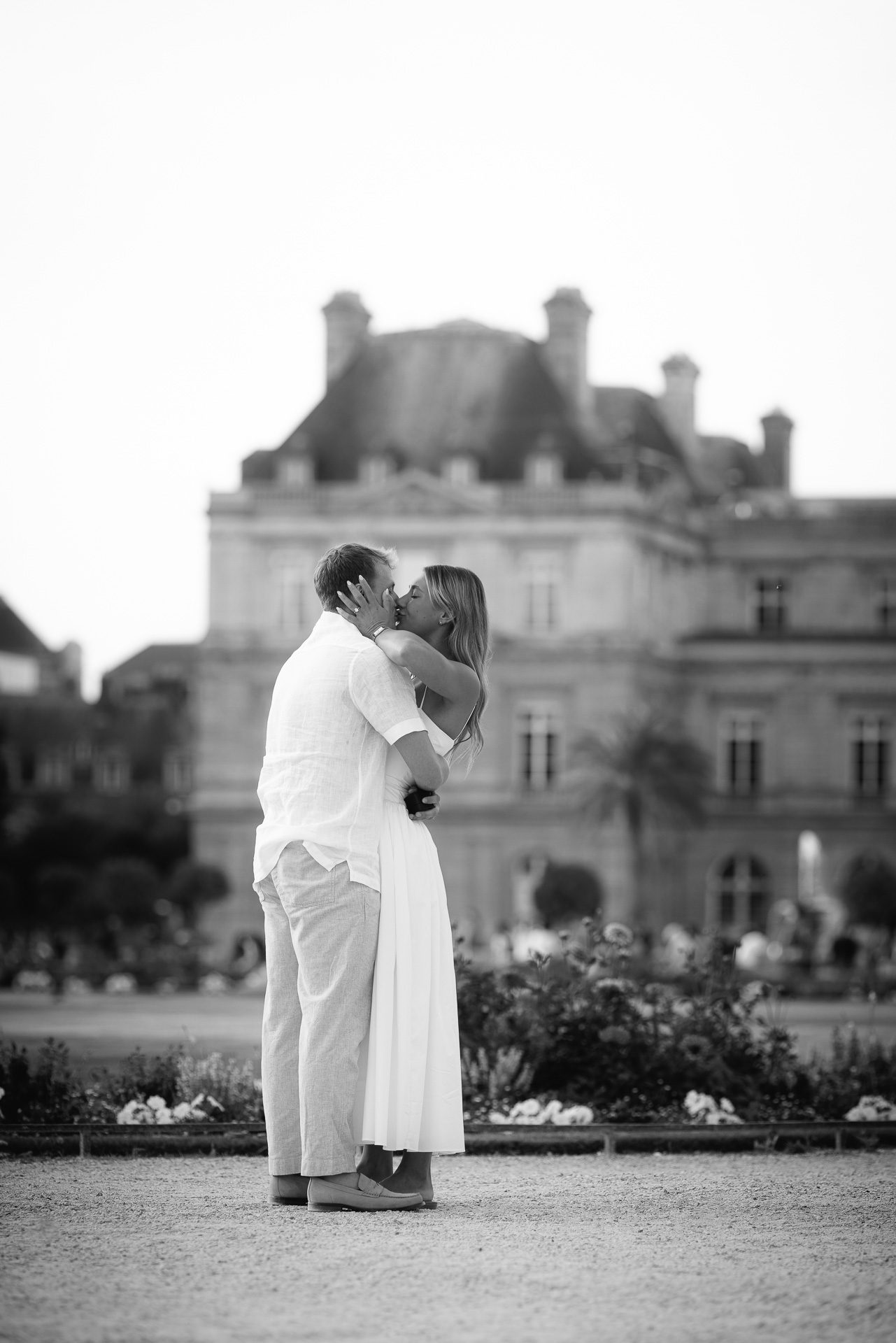 First kiss as an engaged couple in front of the Luxembourg Palace