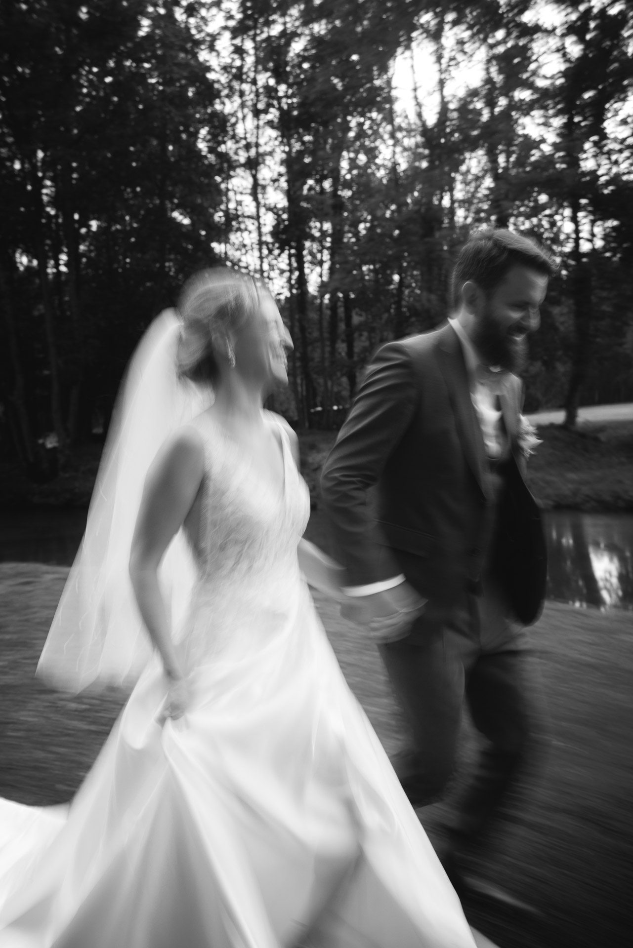 Newlyweds recessional with petals at an outdoor ceremony in France