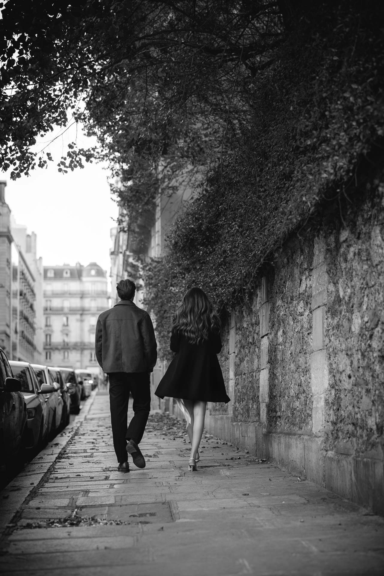 Couple by the Seine with the Pont des Arts in the background